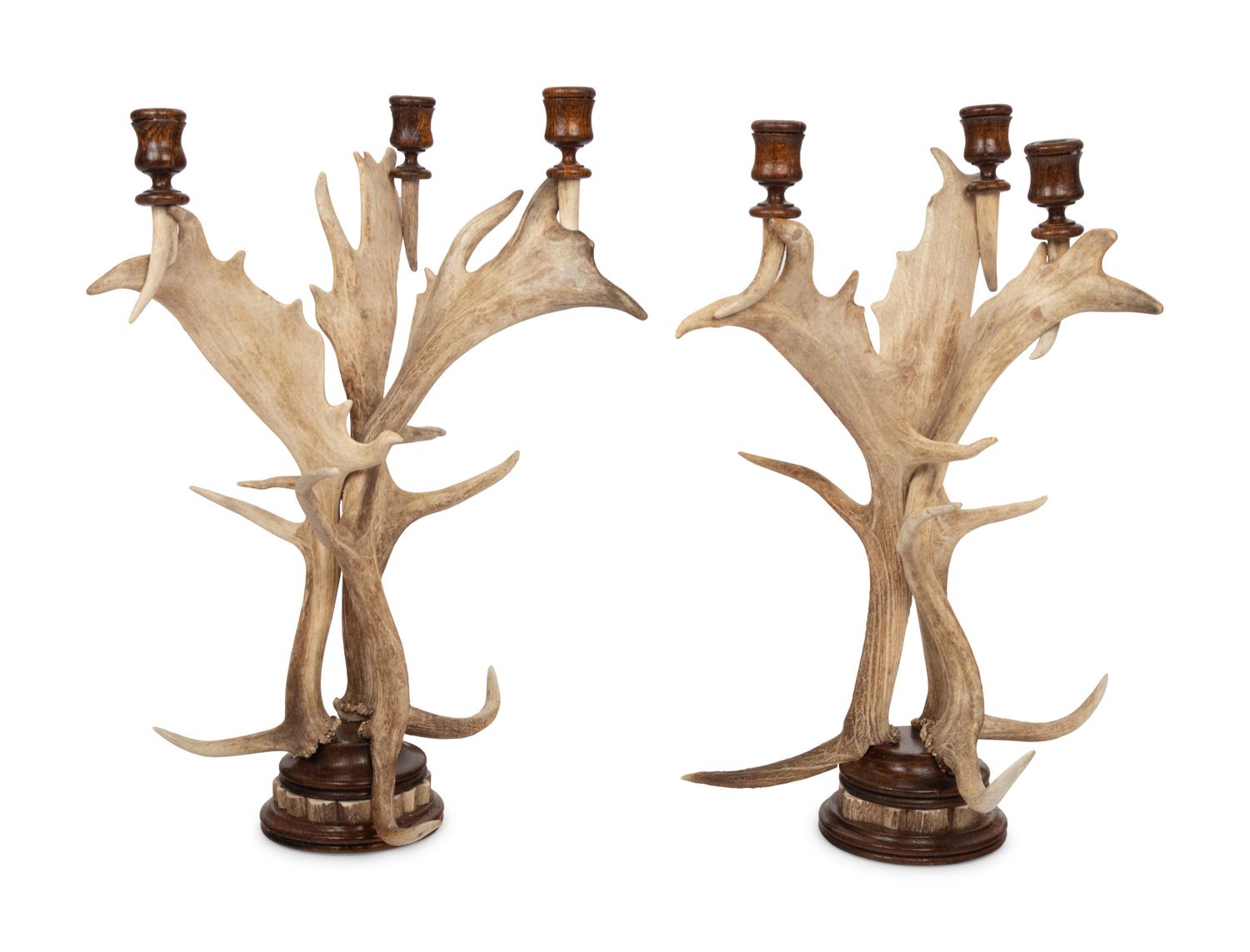 A Pair of Antler Mounted Three-Light Candelabra