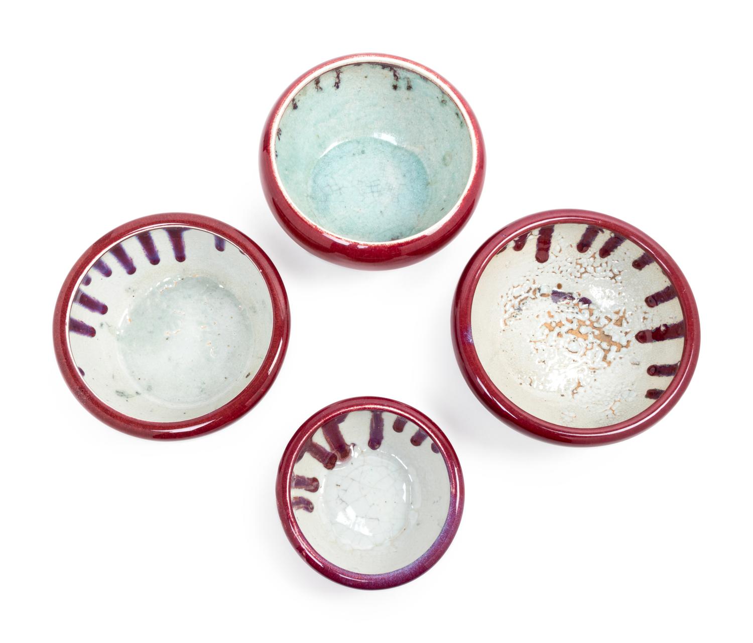 Four Monochrome Red Glazed Tripod Incense Burners