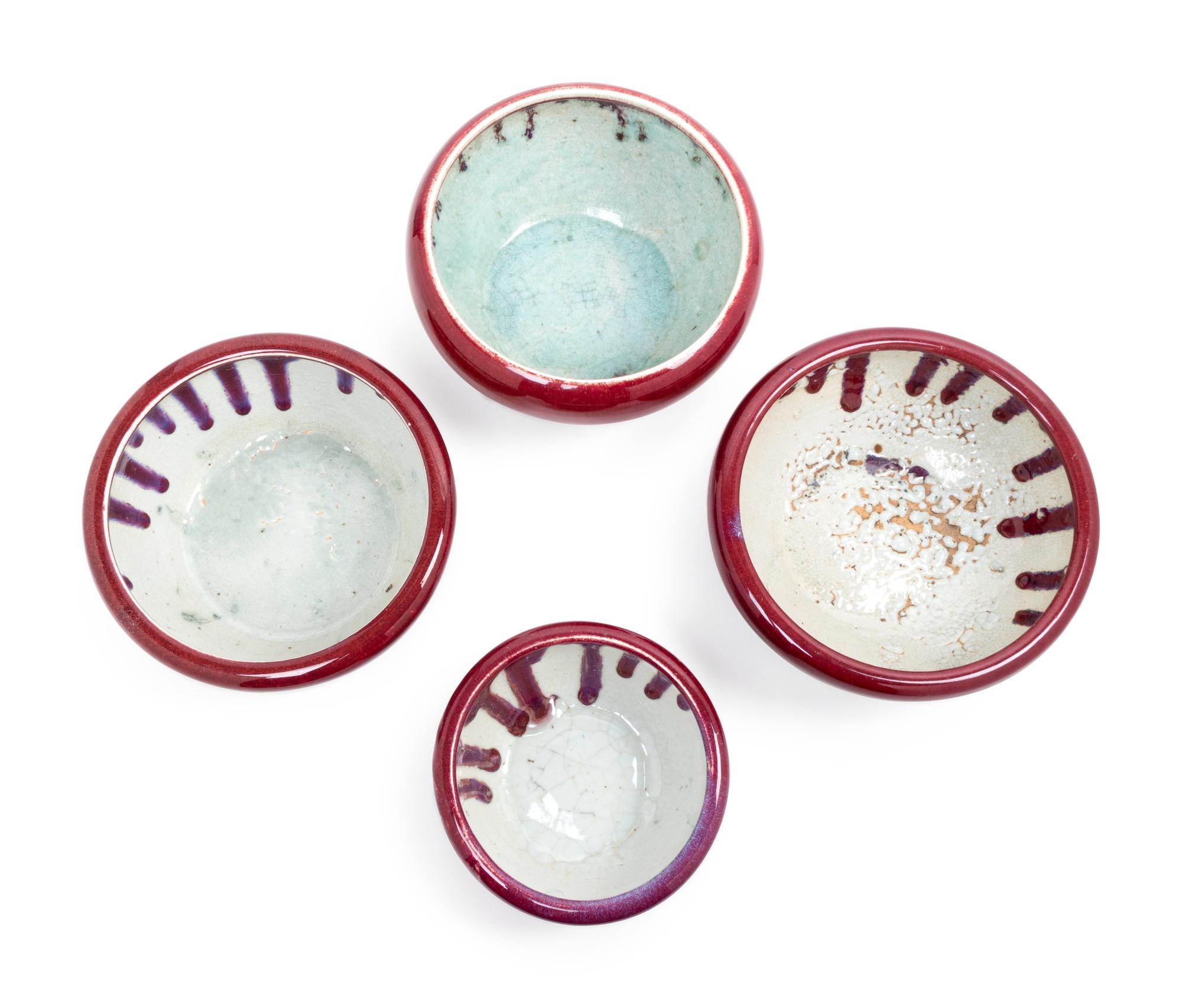 Four Monochrome Red Glazed Tripod Incense Burners