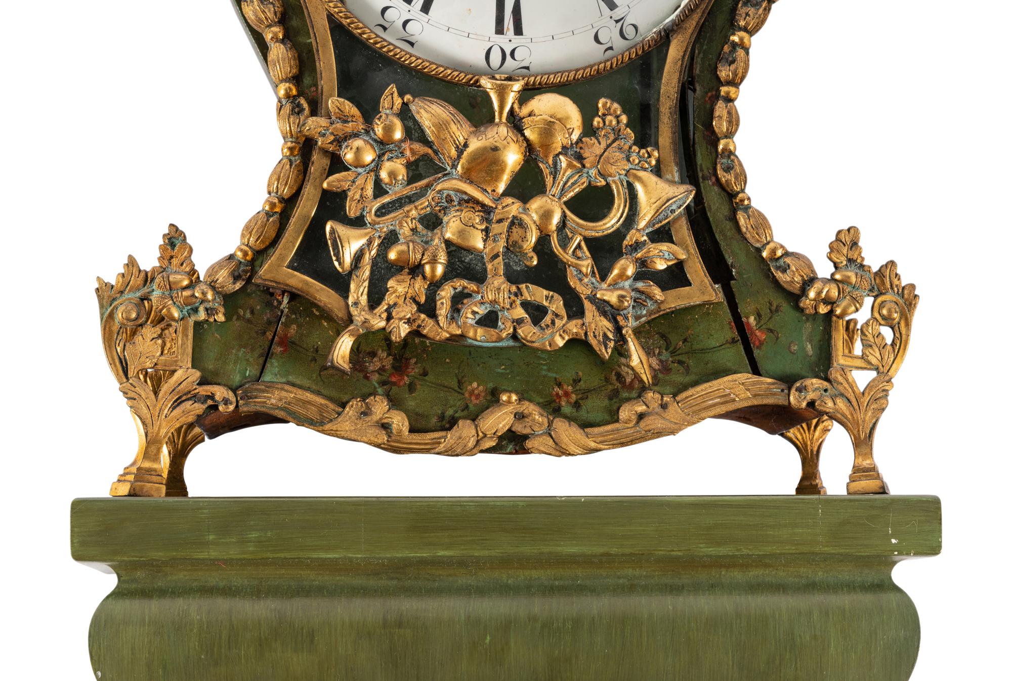 A Louis XV Gilt Metal Mounted Green-Painted Bracket Clock and Bracket