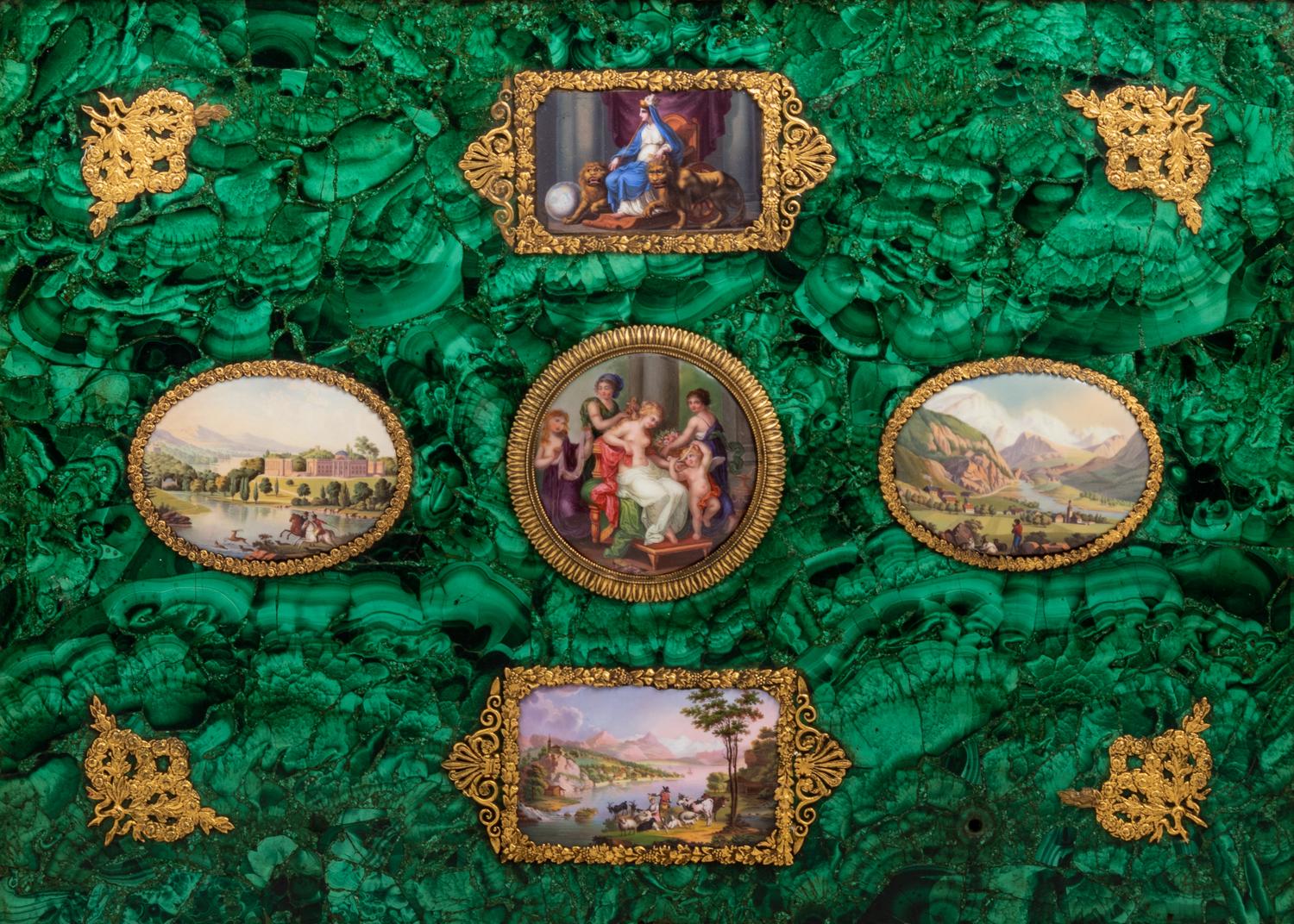 An Enamel Plaque and Gilt Metal Mounted Malachite Veneered Panel in a Giltwood Hinged Frame