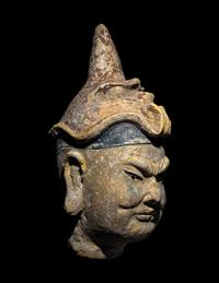 A Polychrome Stucco Head of a Temple Guardian