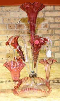 A Cranberry Glass Epergne. Height of 22 3/4 inches.