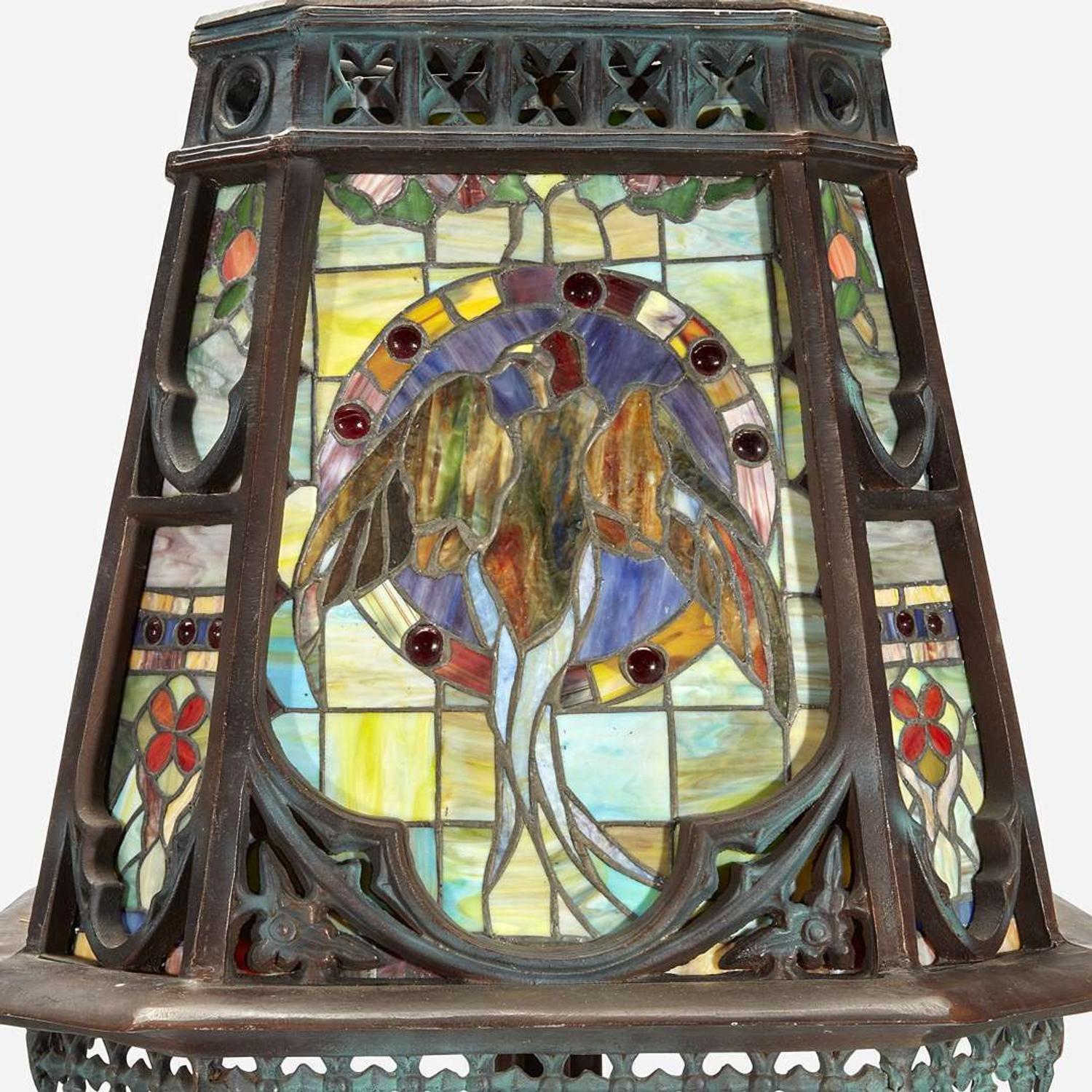 An Arts & Crafts Style Patinated Bronze and Stained Glass Standard Lamp 20th century