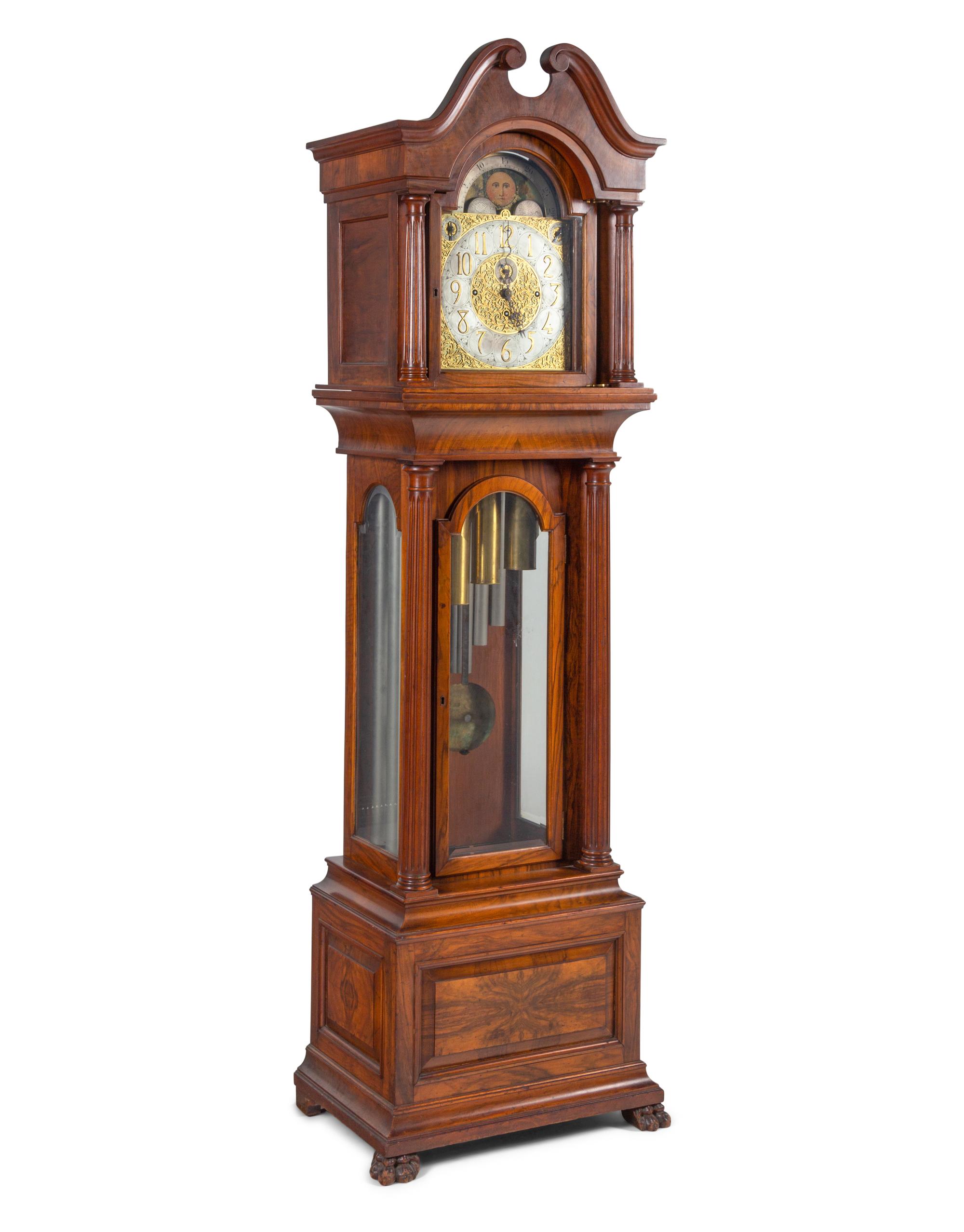 An Elliott Walnut Nine-Tube Tall Case Clock