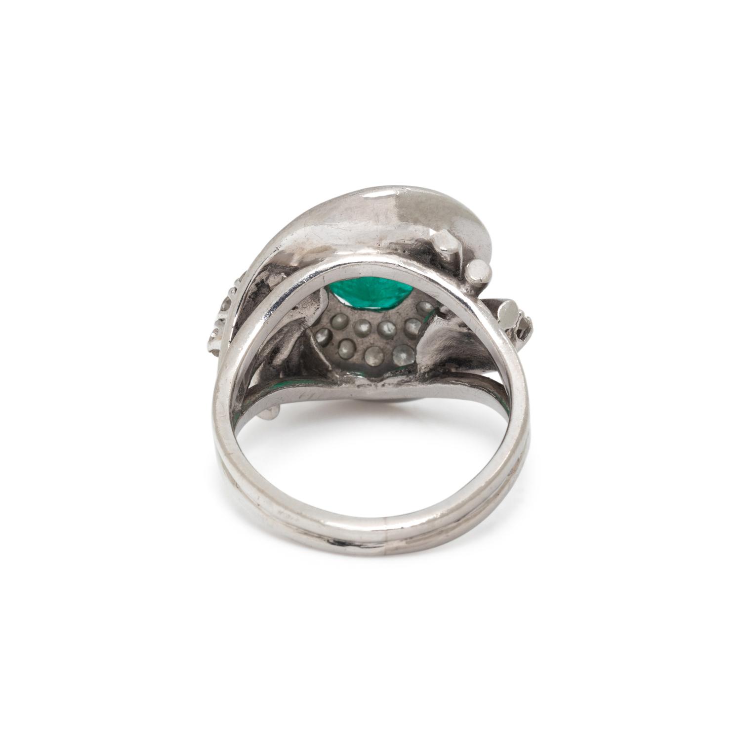 PLATINUM, EMERALD, AND DIAMOND RING