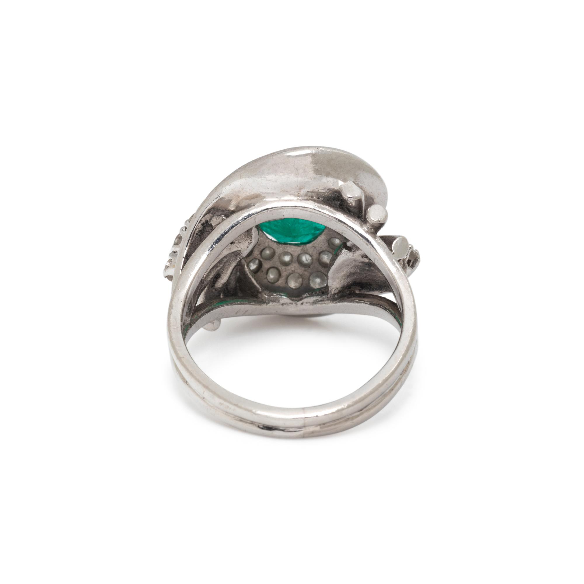 PLATINUM, EMERALD, AND DIAMOND RING
