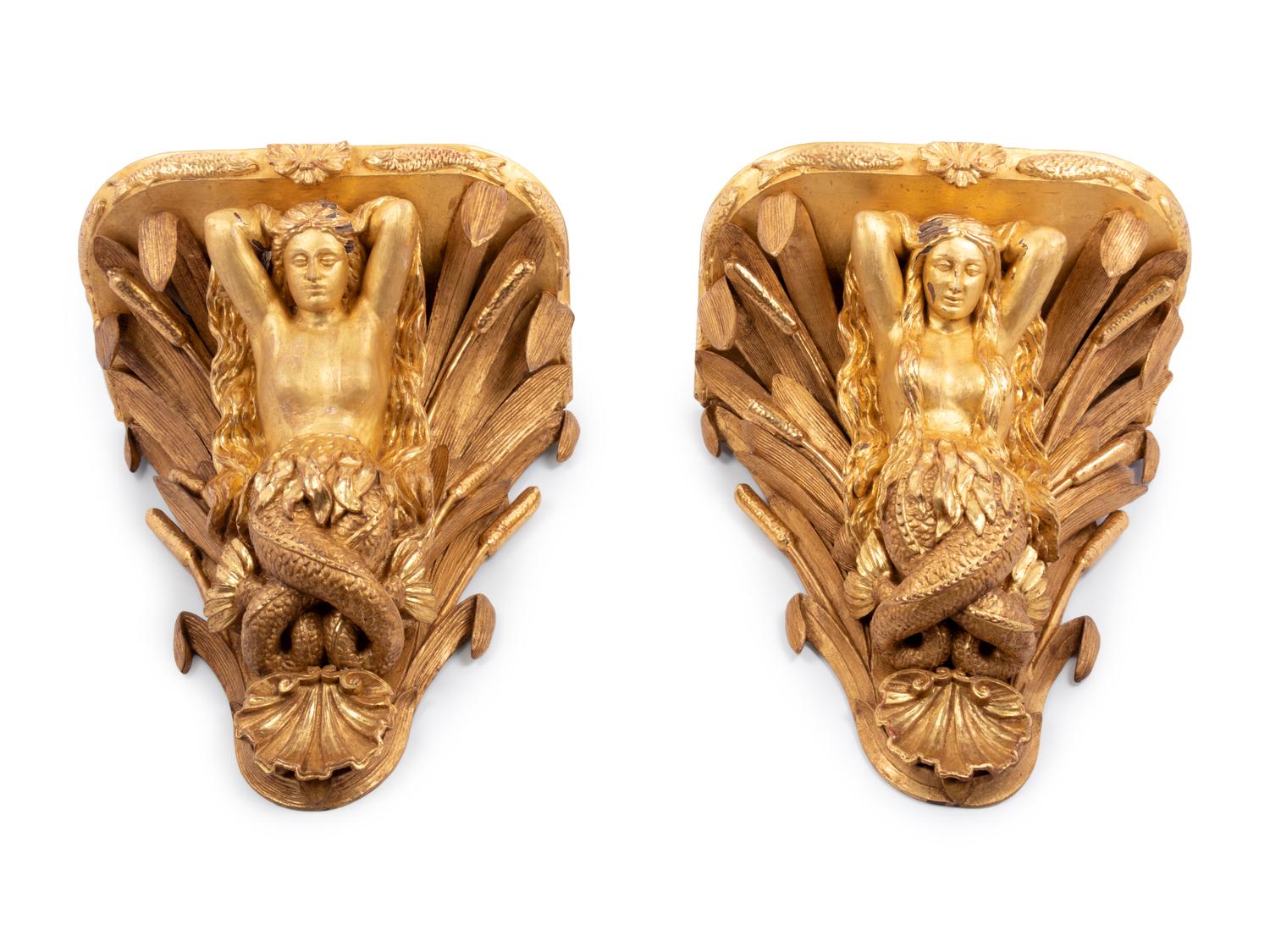 A Pair of English Carved Giltwood Figural Wall Brackets