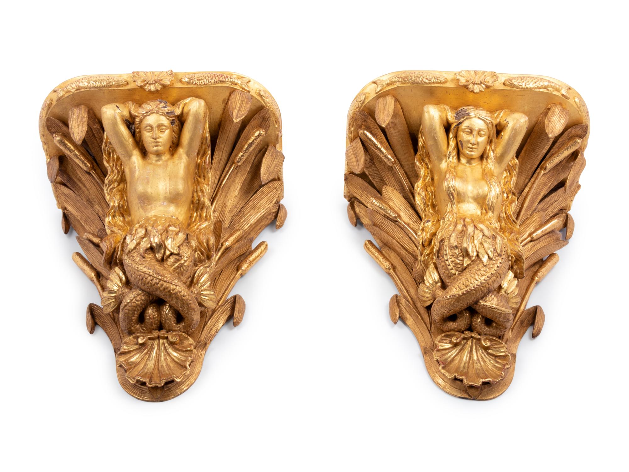 A Pair of English Carved Giltwood Figural Wall Brackets