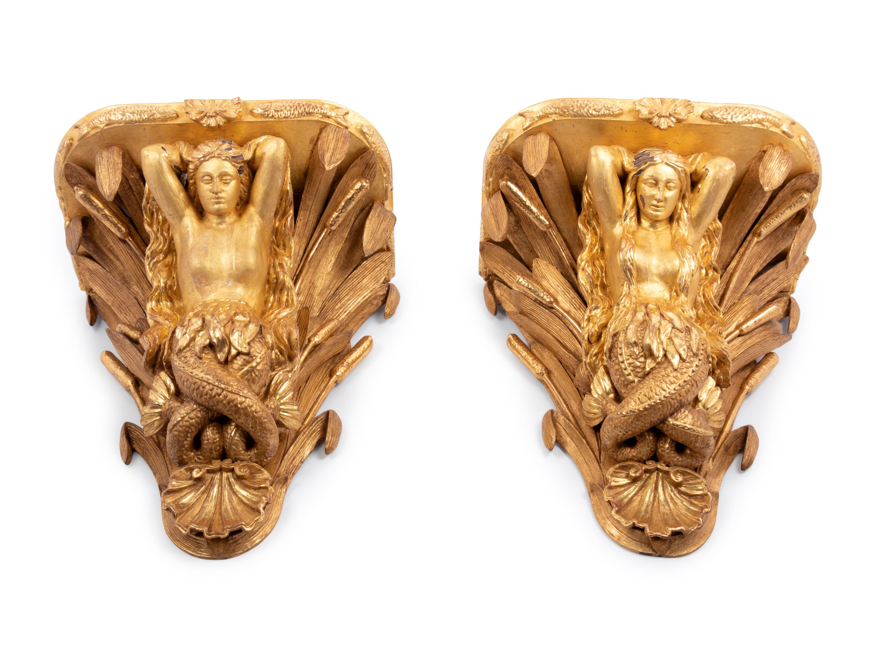 A Pair of English Carved Giltwood Figural Wall Brackets