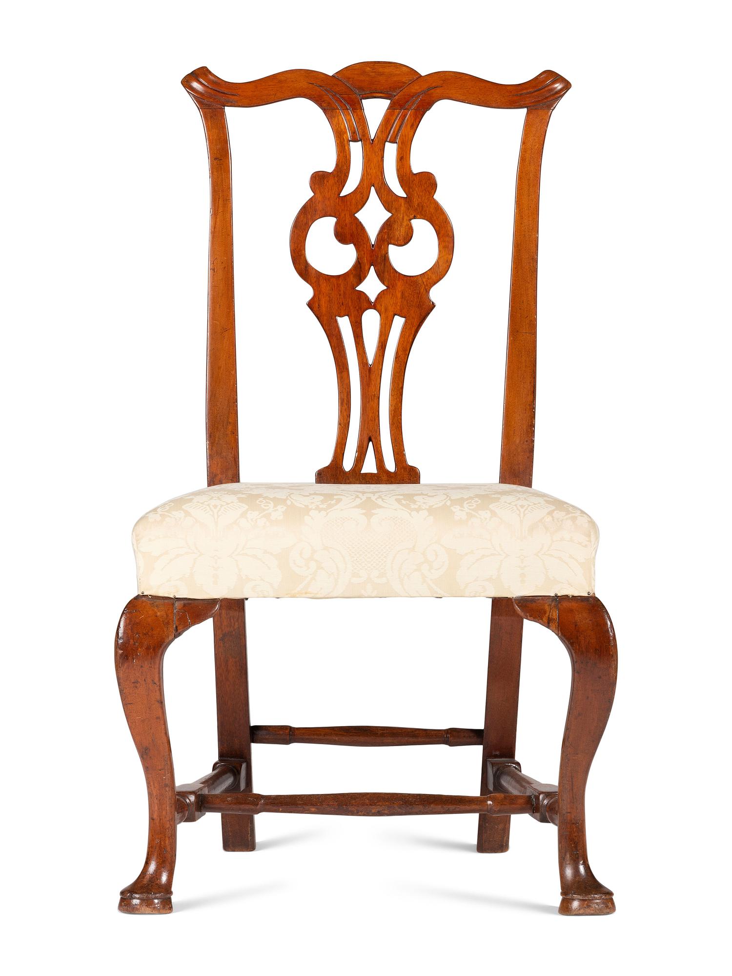 A Queen Anne Carved Cherrywood Owl's Eye Side Chair