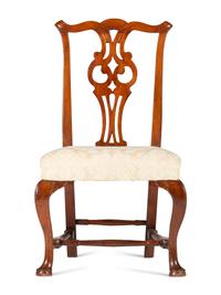 A Queen Anne Carved Cherrywood Owl's Eye Side Chair