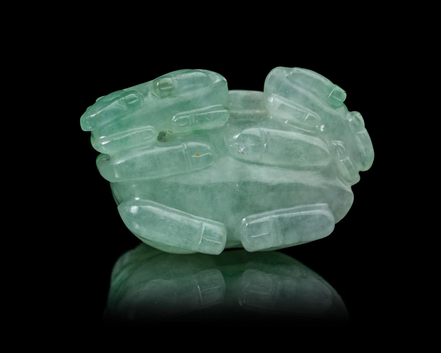 A Chinese Semi-Translucent Apple Green and Pale Celadon Jadeite 'Three Rams' Figural Group