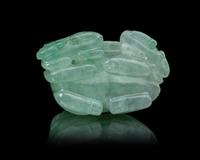 A Chinese Semi-Translucent Apple Green and Pale Celadon Jadeite 'Three Rams' Figural Group