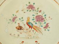A Chinese Export Armorial Porcelain Plate with Restoration