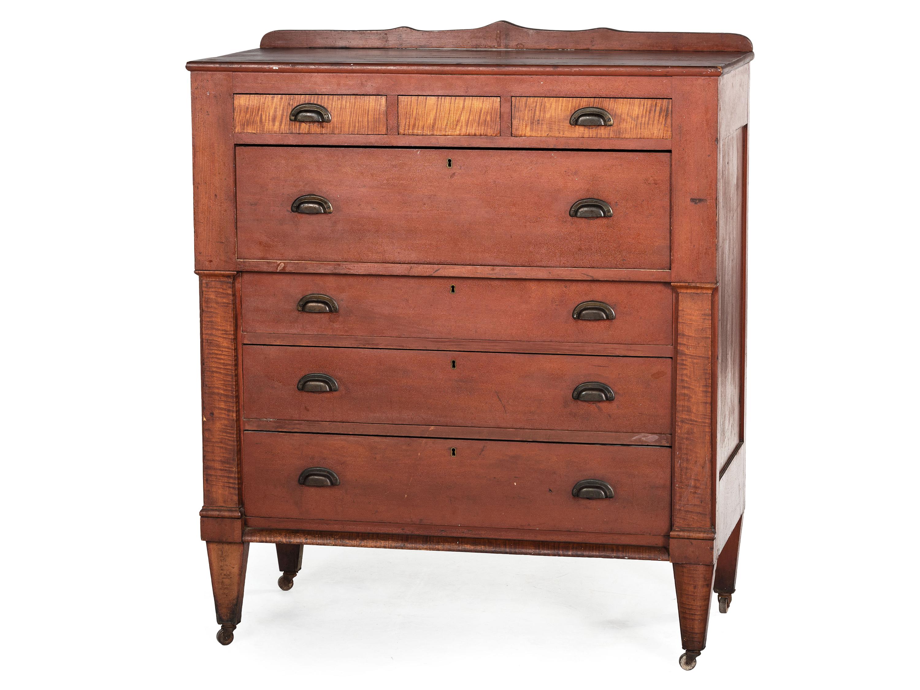 An Ohio Mennonite Red-Stained Cherrywood and Tiger Maple Chest of Drawers