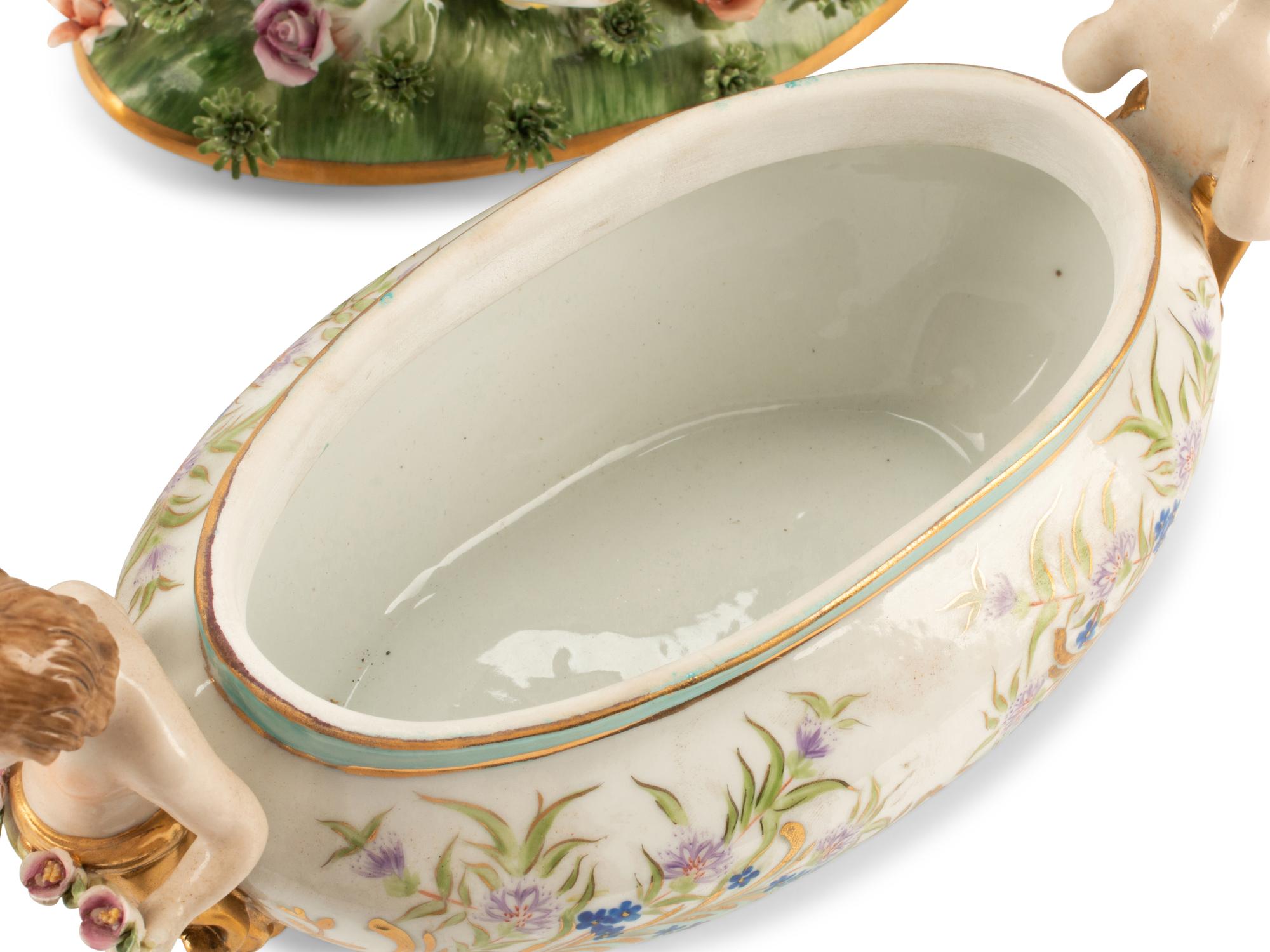 A Pair of German Porcelain Figural Tureens