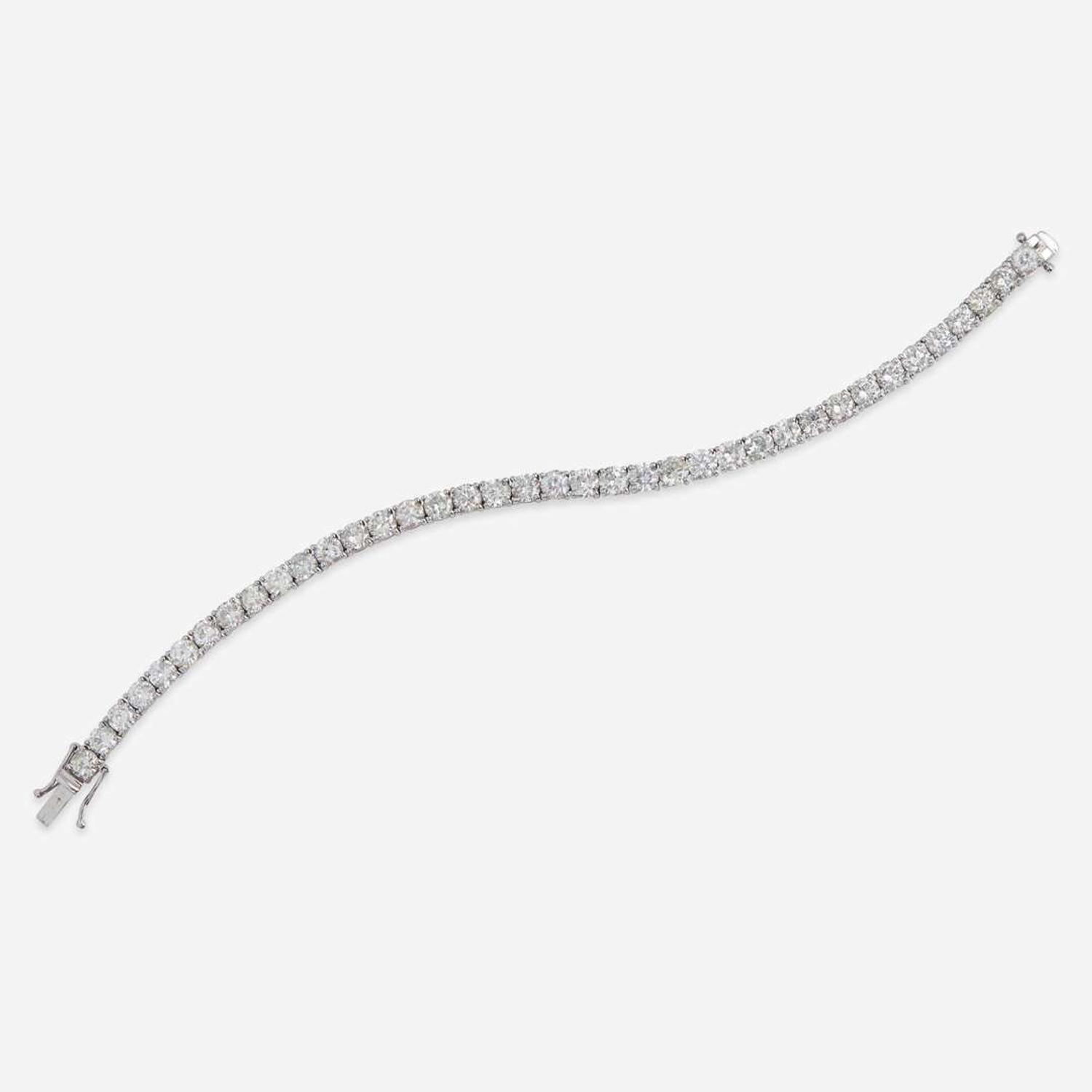 A 14K White Gold and Diamond Line Bracelet