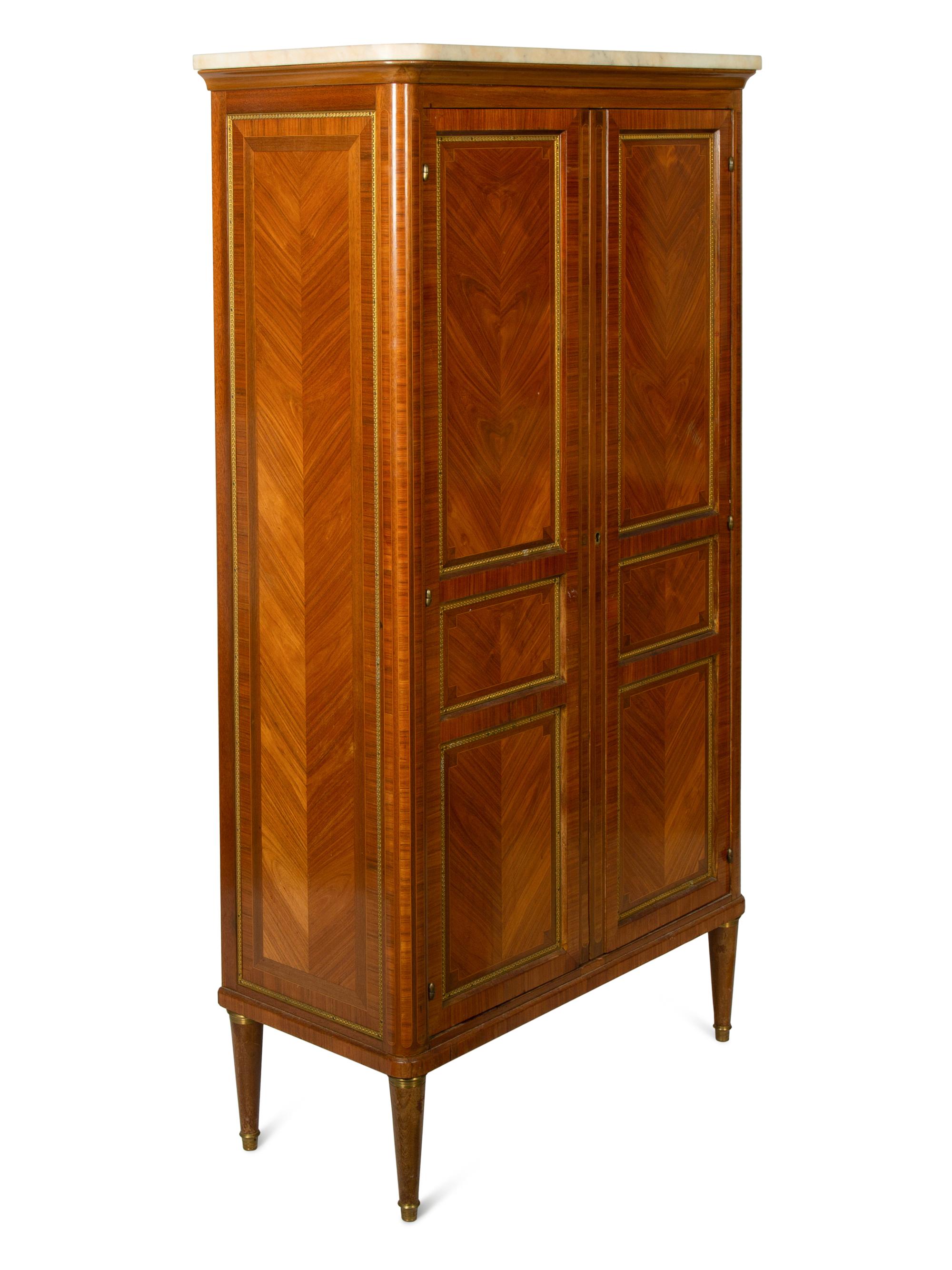 A Louis XVI Style Gilt Bronze Mounted Tulipwood Marble-Top Cabinet