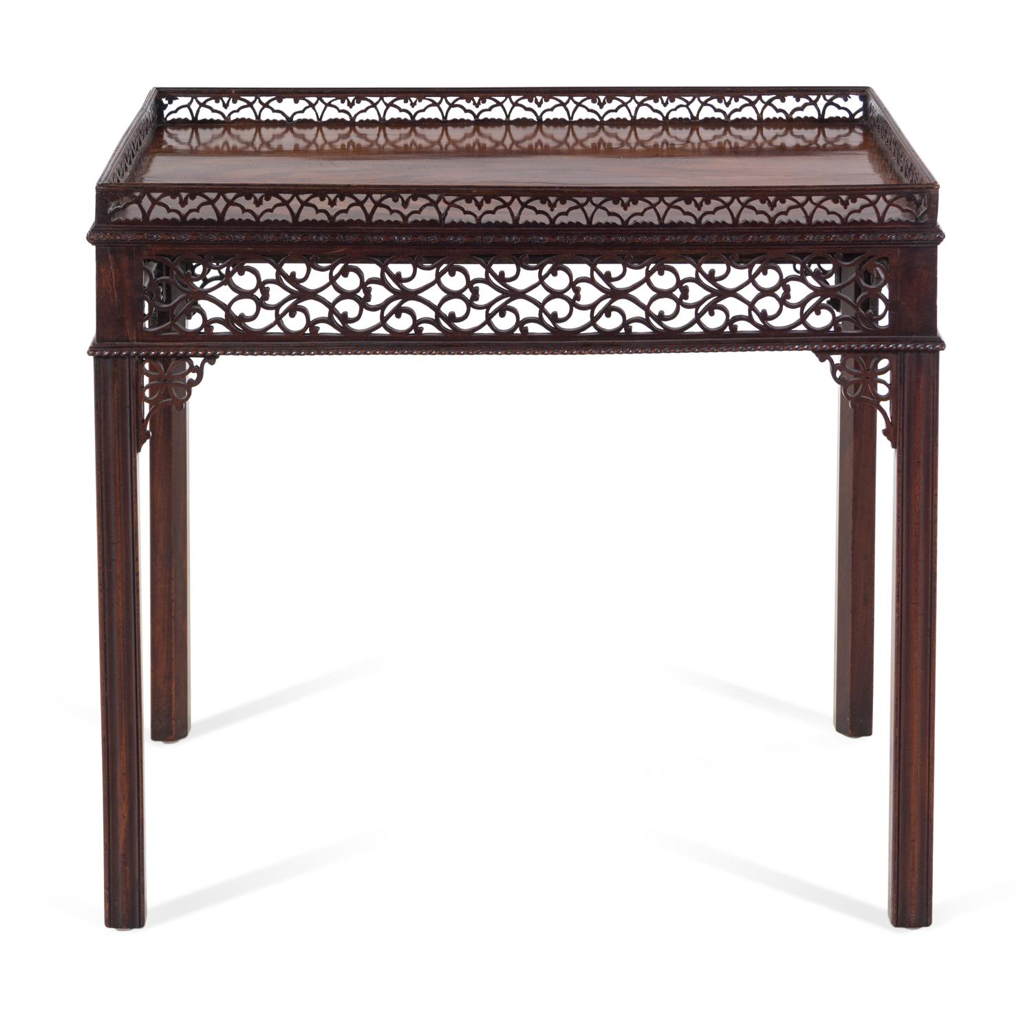 A George III Chinese Chippendale Style Carved and Figured Mahogany Silver Table