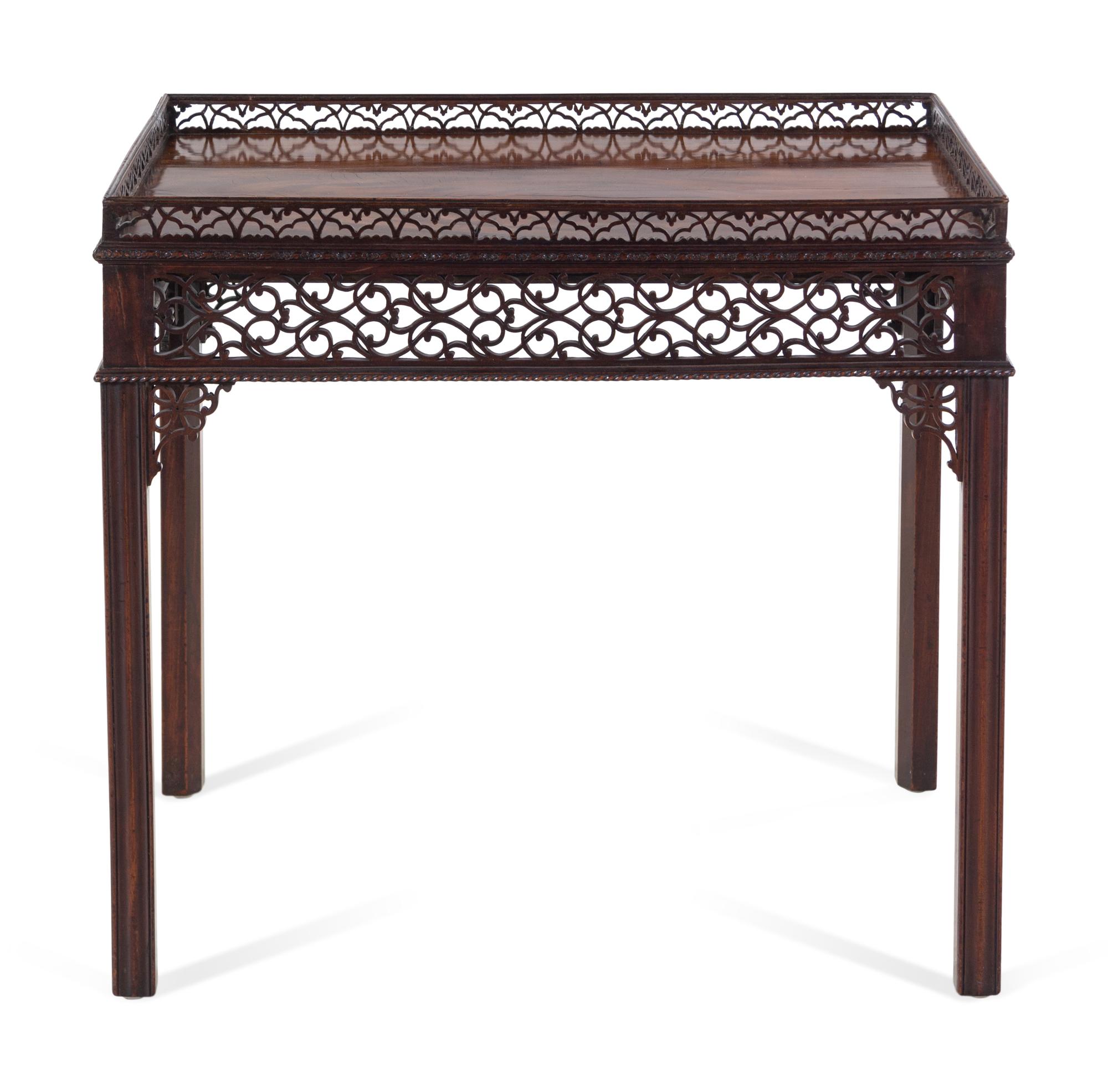 A George III Chinese Chippendale Style Carved and Figured Mahogany Silver Table