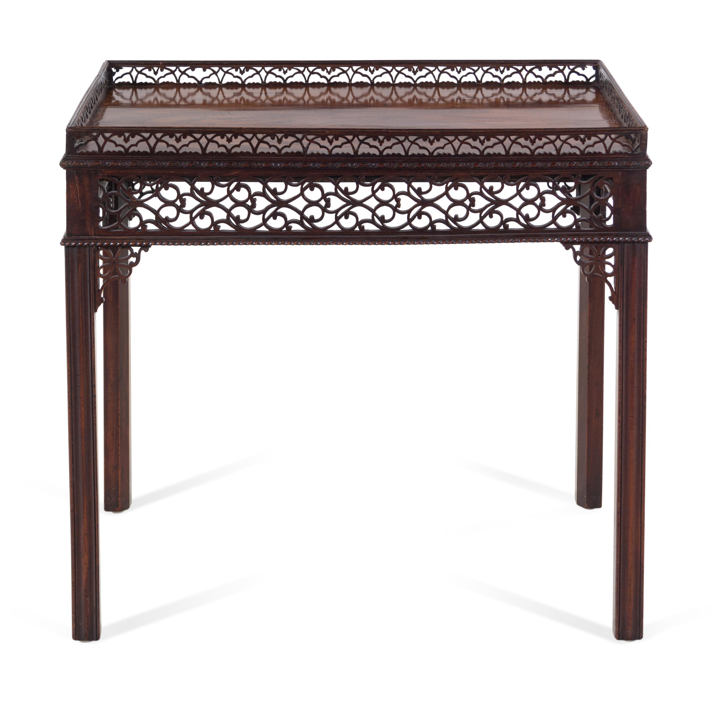 A George III Chinese Chippendale Style Carved and Figured Mahogany Silver Table