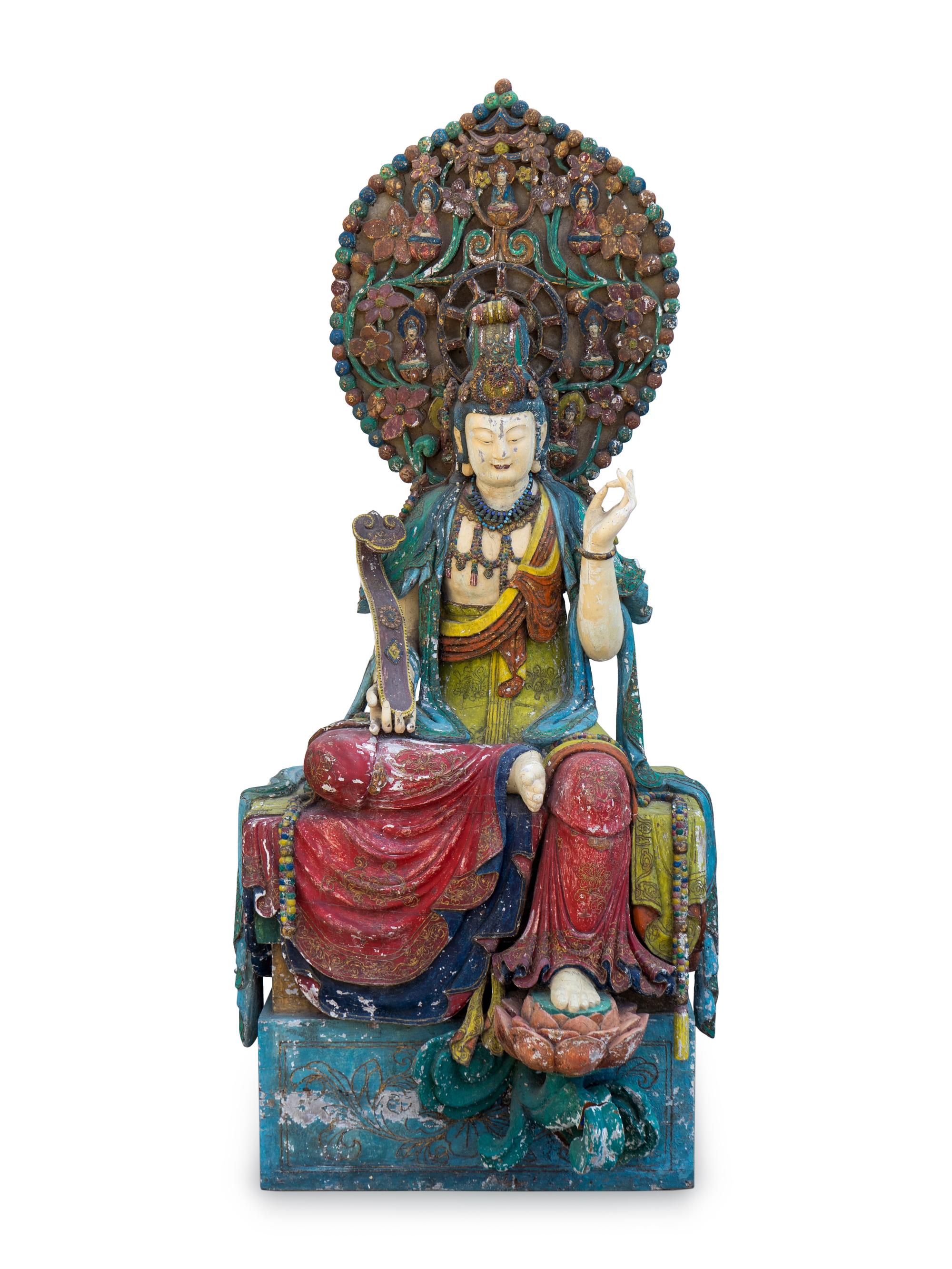 A Large Polychromed Wood Figure of Seated Guanyin