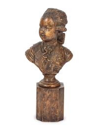 A French Carved Fruitwood Bust of a Young Louis XVI