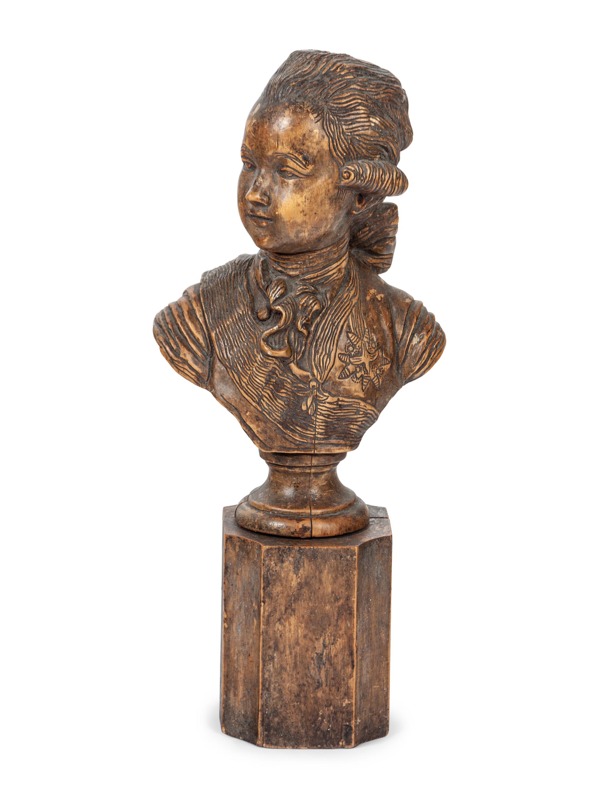 A French Carved Fruitwood Bust of a Young Louis XVI