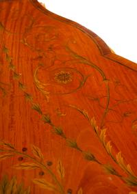 An Edwardian Satinwood and Marquetry Serpentine-Front Cabinet
