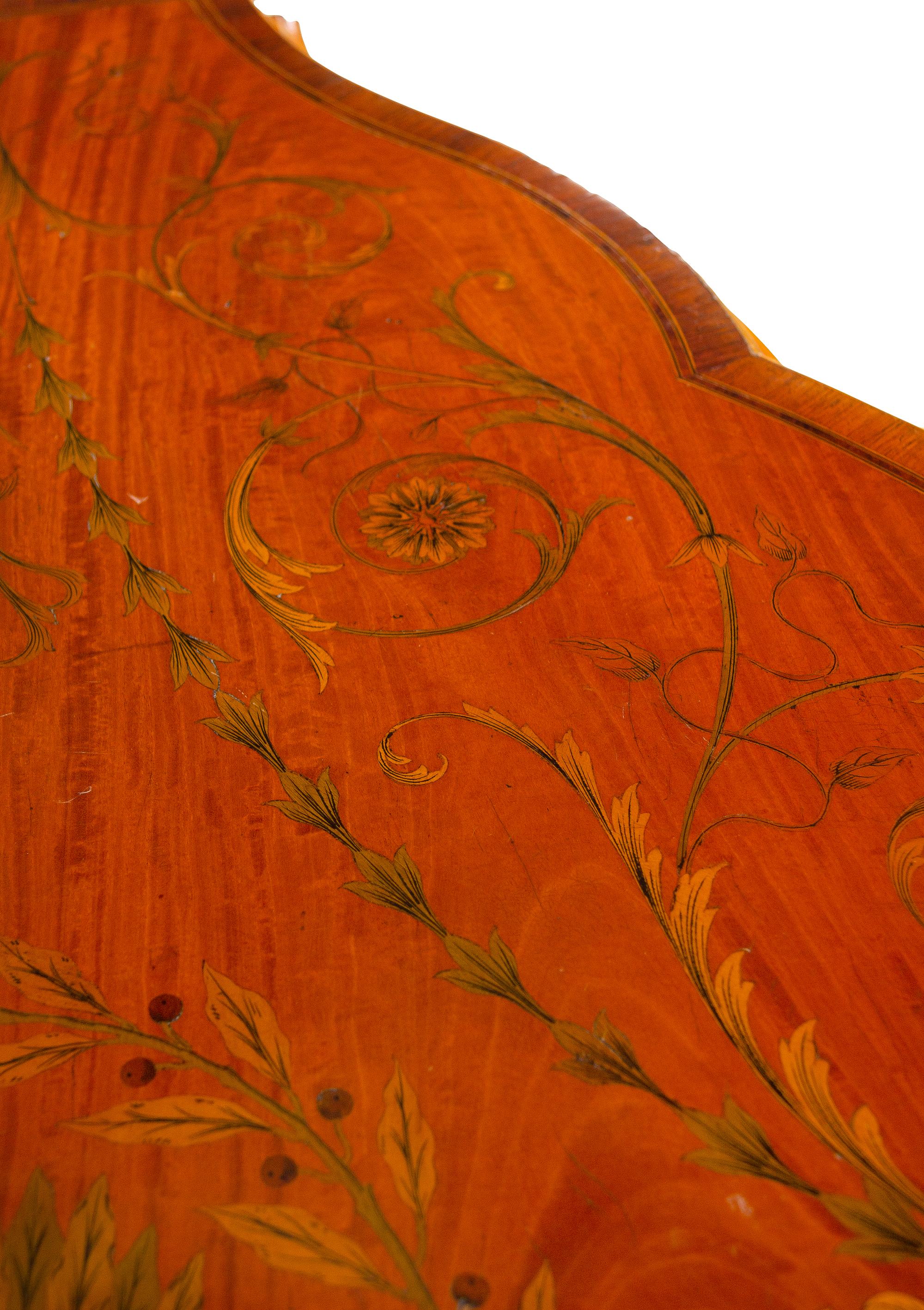 An Edwardian Satinwood and Marquetry Serpentine-Front Cabinet