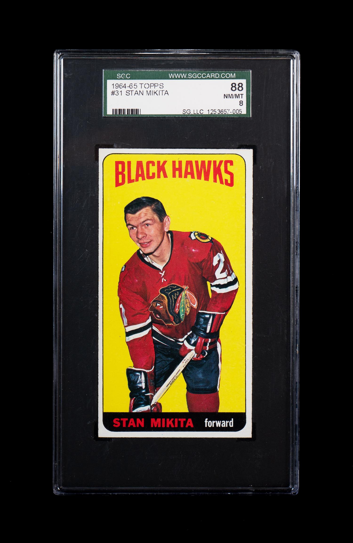 A 1964 Topps Stan Mikita Hockey Card No. 31 (SGC 88 NM-MT 8)