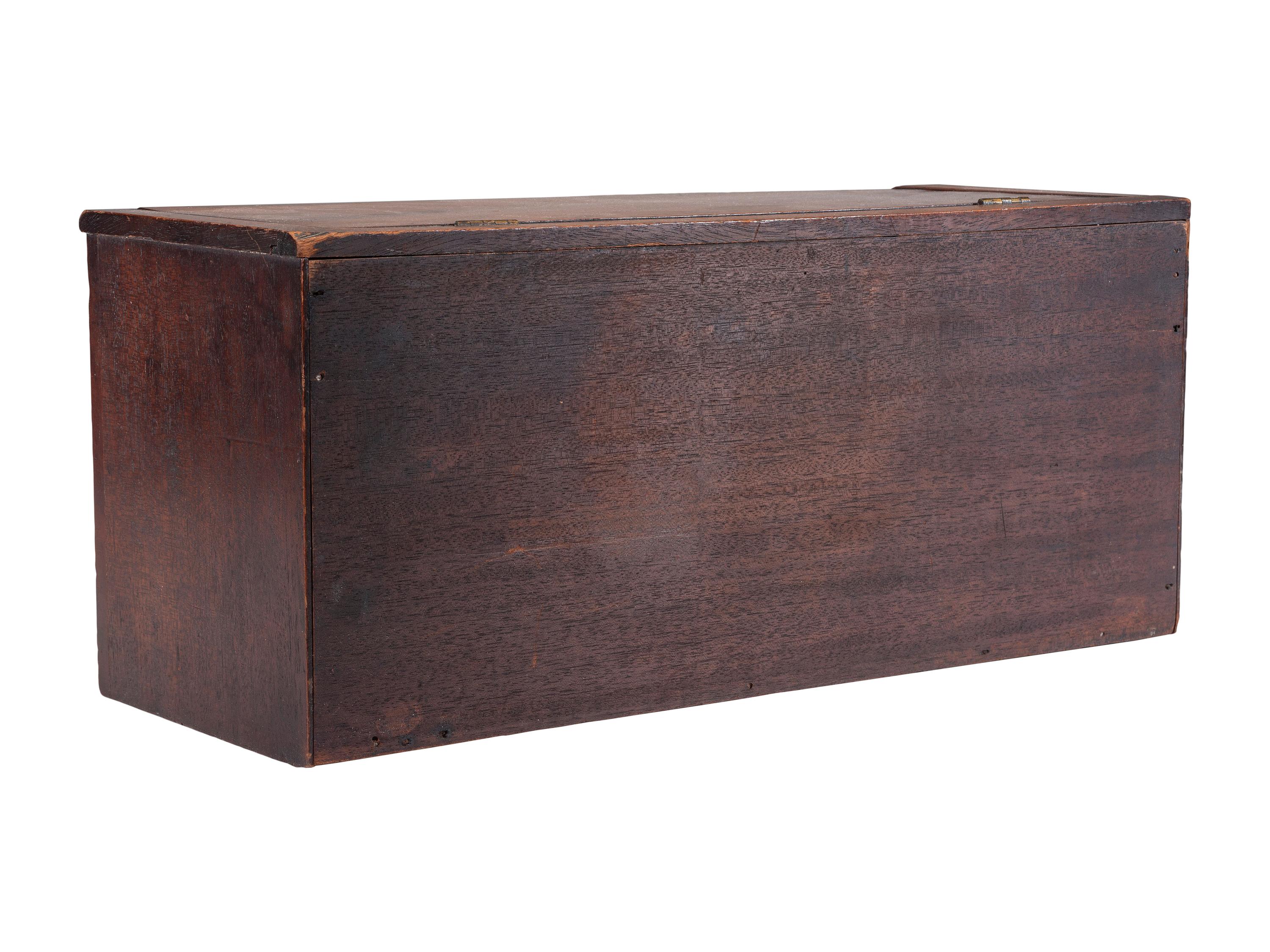 A Miniature Mahogany Tabletop Storage Chest