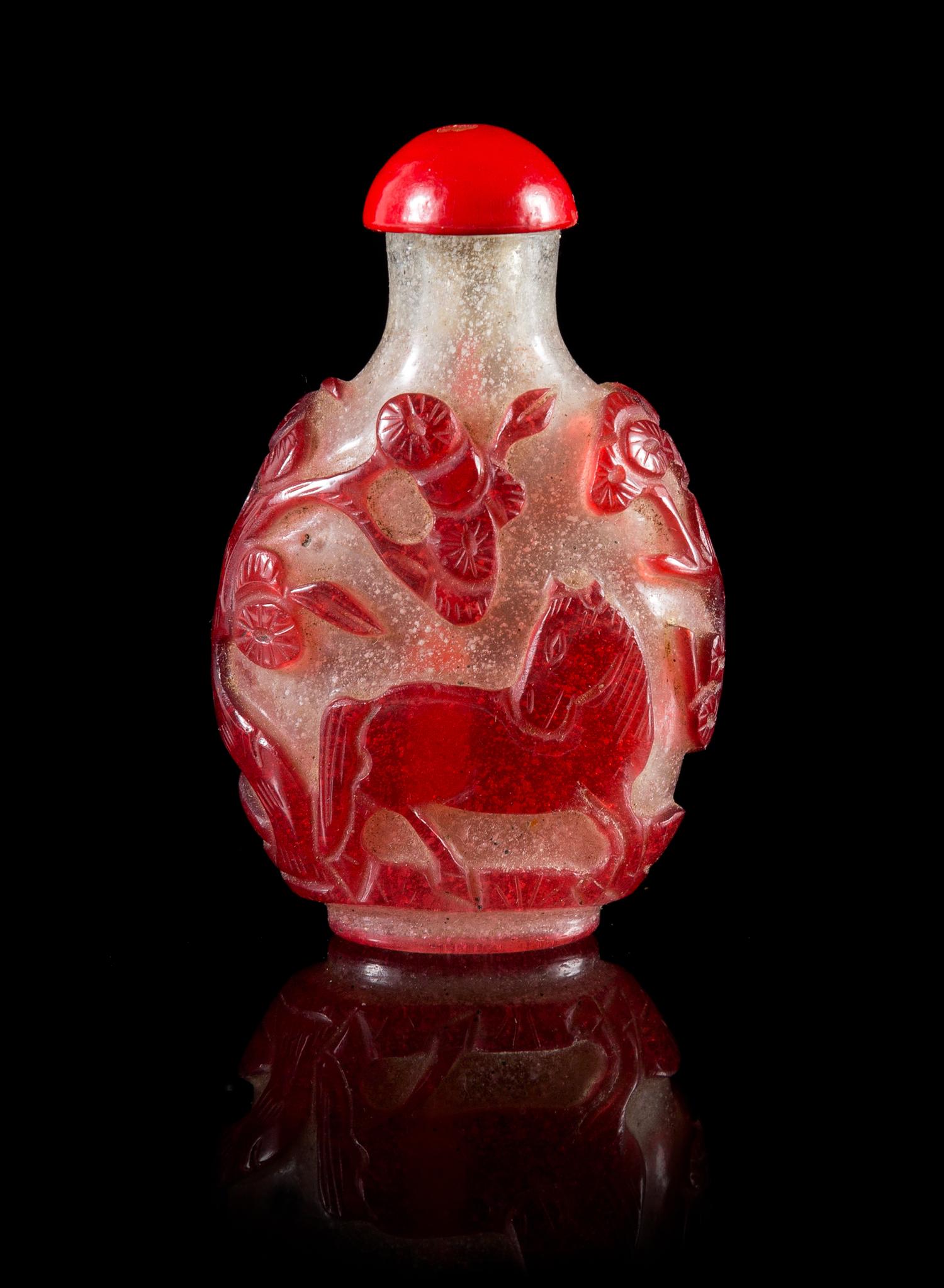 A Red Overlay Peking Glass Snuff Bottle Height 2 5/8 inches.