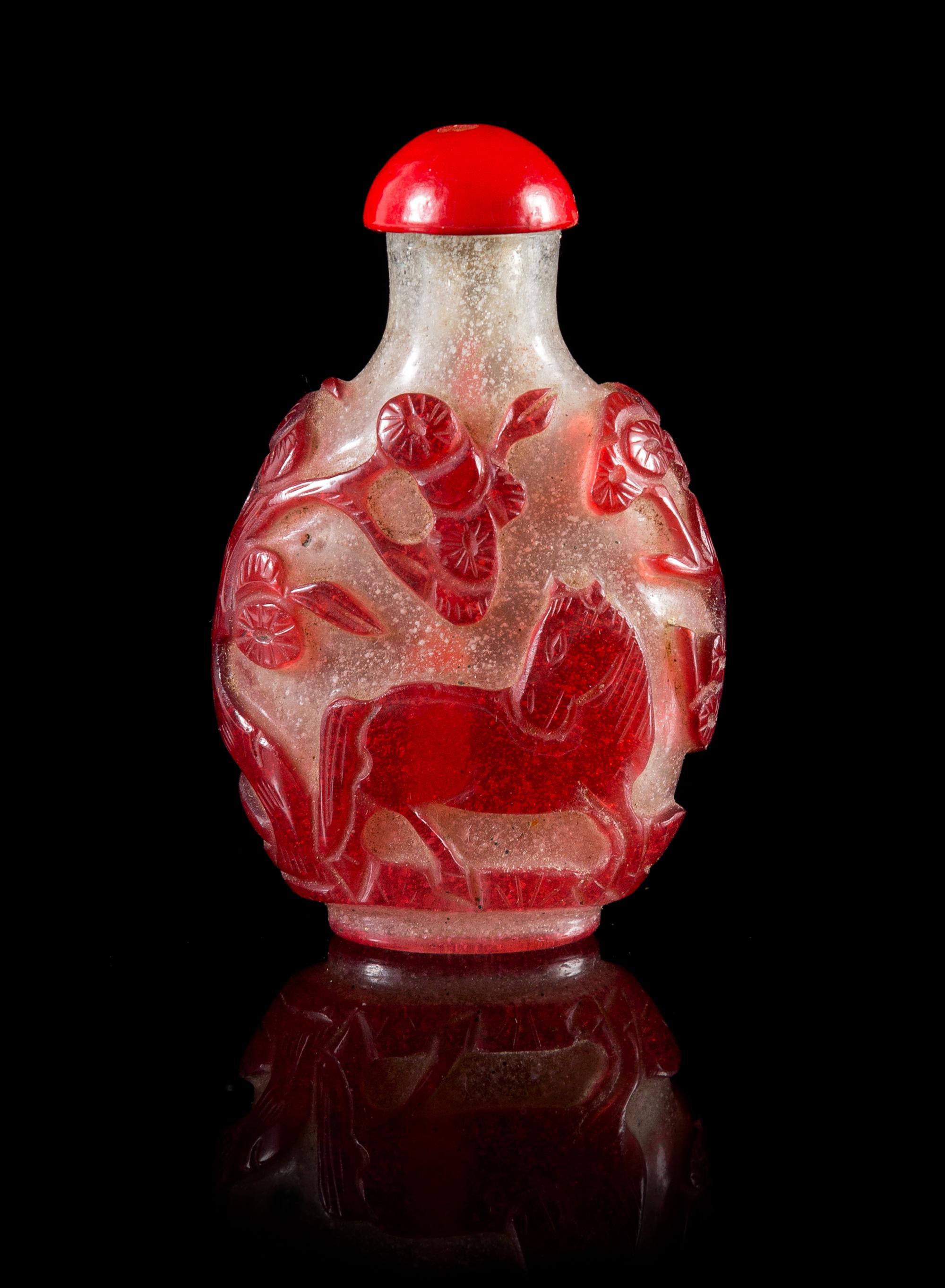 A Red Overlay Peking Glass Snuff Bottle Height 2 5/8 inches.