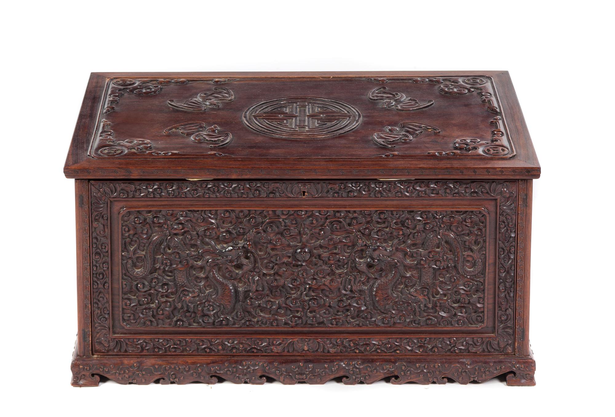 A Chinese Relief Carved Hardwood Chest 19TH CENTURY Height 13 3/4 x width 27 5/8 x depth 17 1/4 inches. — 19TH CENTURY