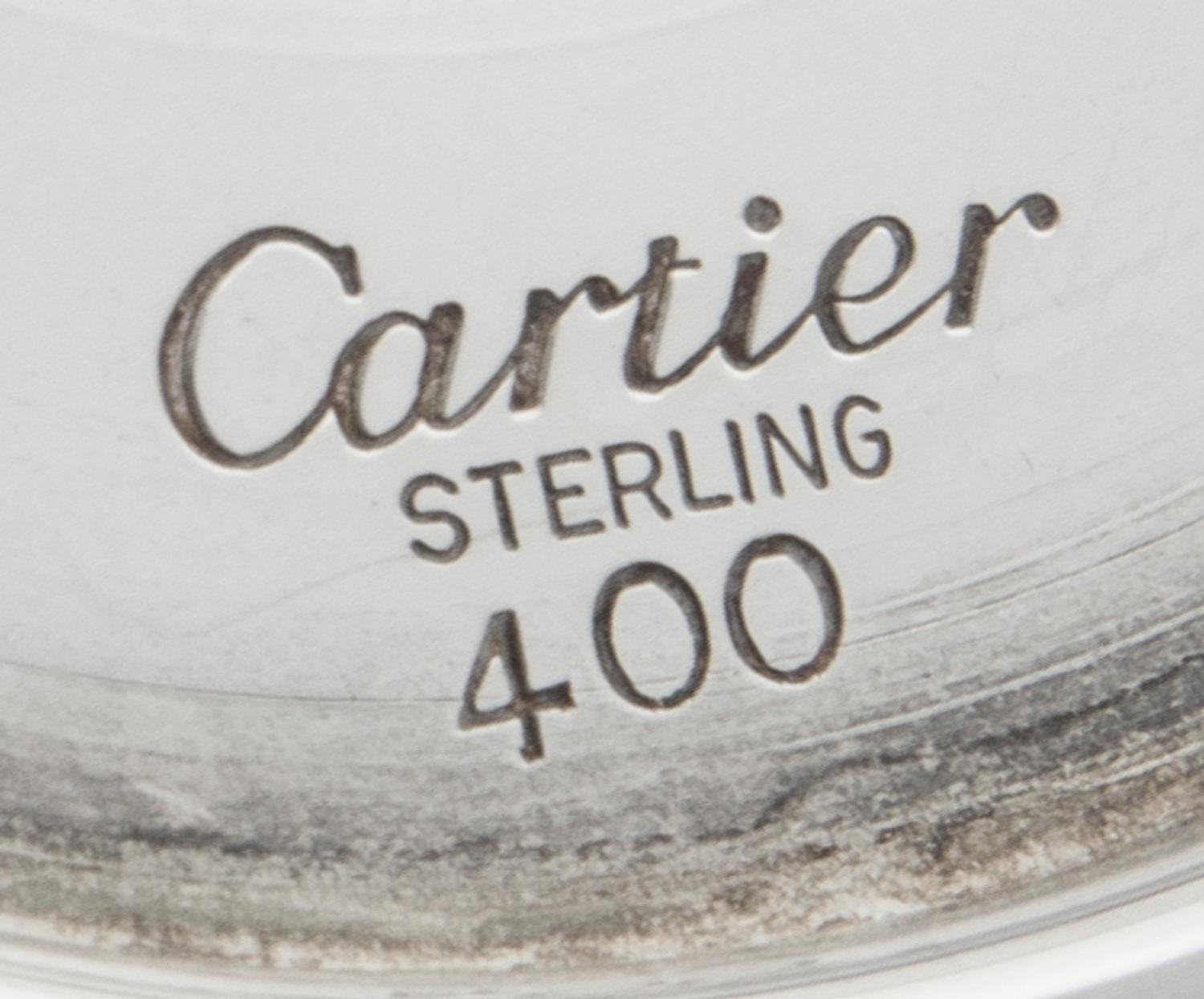 A Pair of French Silver Martini Stems, Cartier, Paris, 20th Century, of typical form.