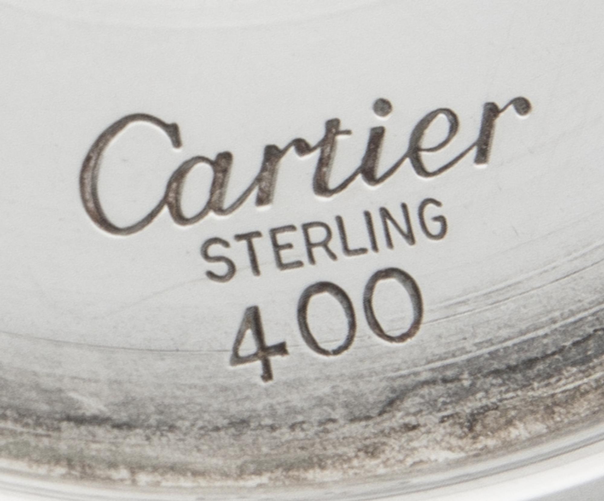 A Pair of French Silver Martini Stems, Cartier, Paris, 20th Century, of typical form.
