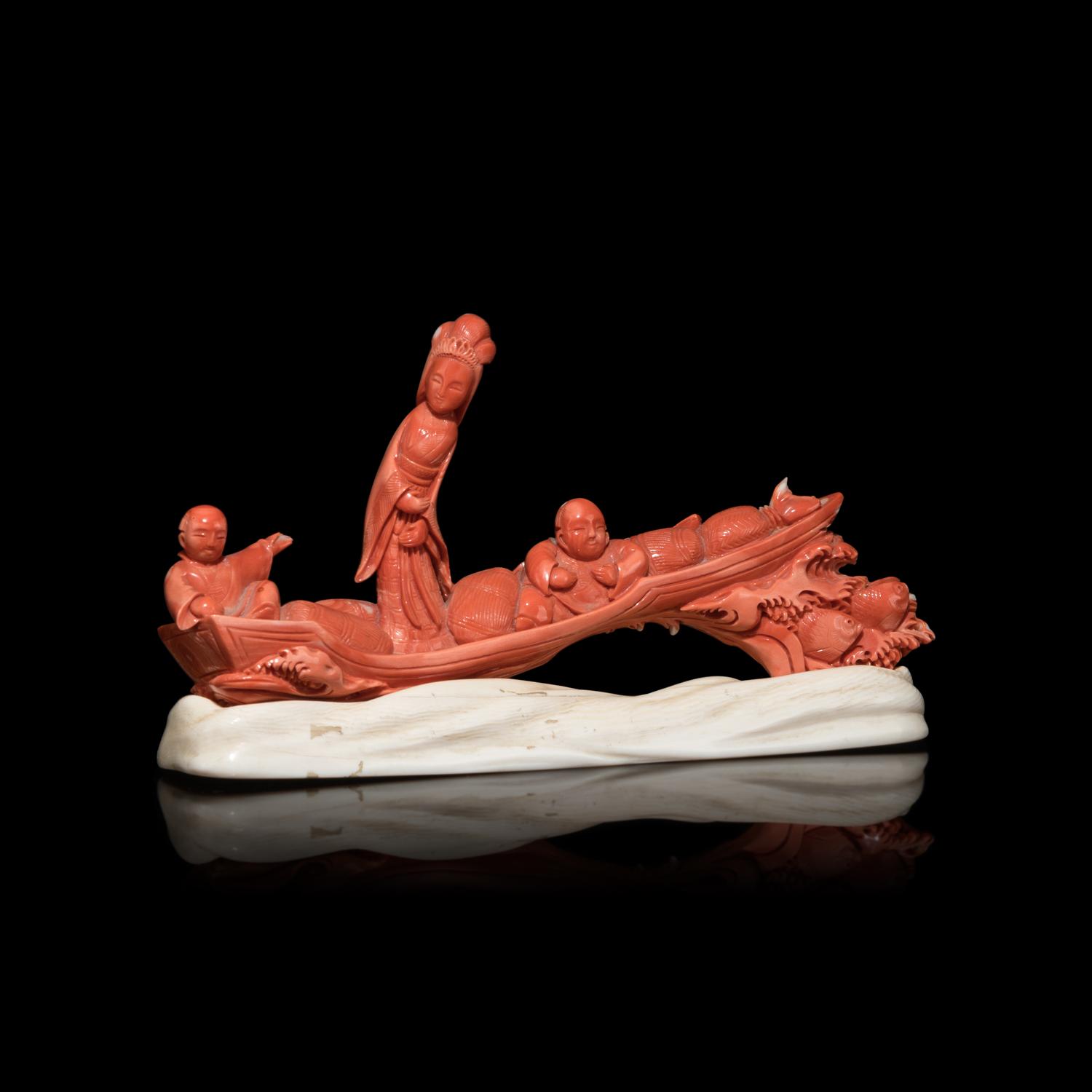 A Chinese Red Coral Carving of a Lady and Two Boys, 19th Century 清晚期 珊瑚雕仙女童子汎舟擺件
