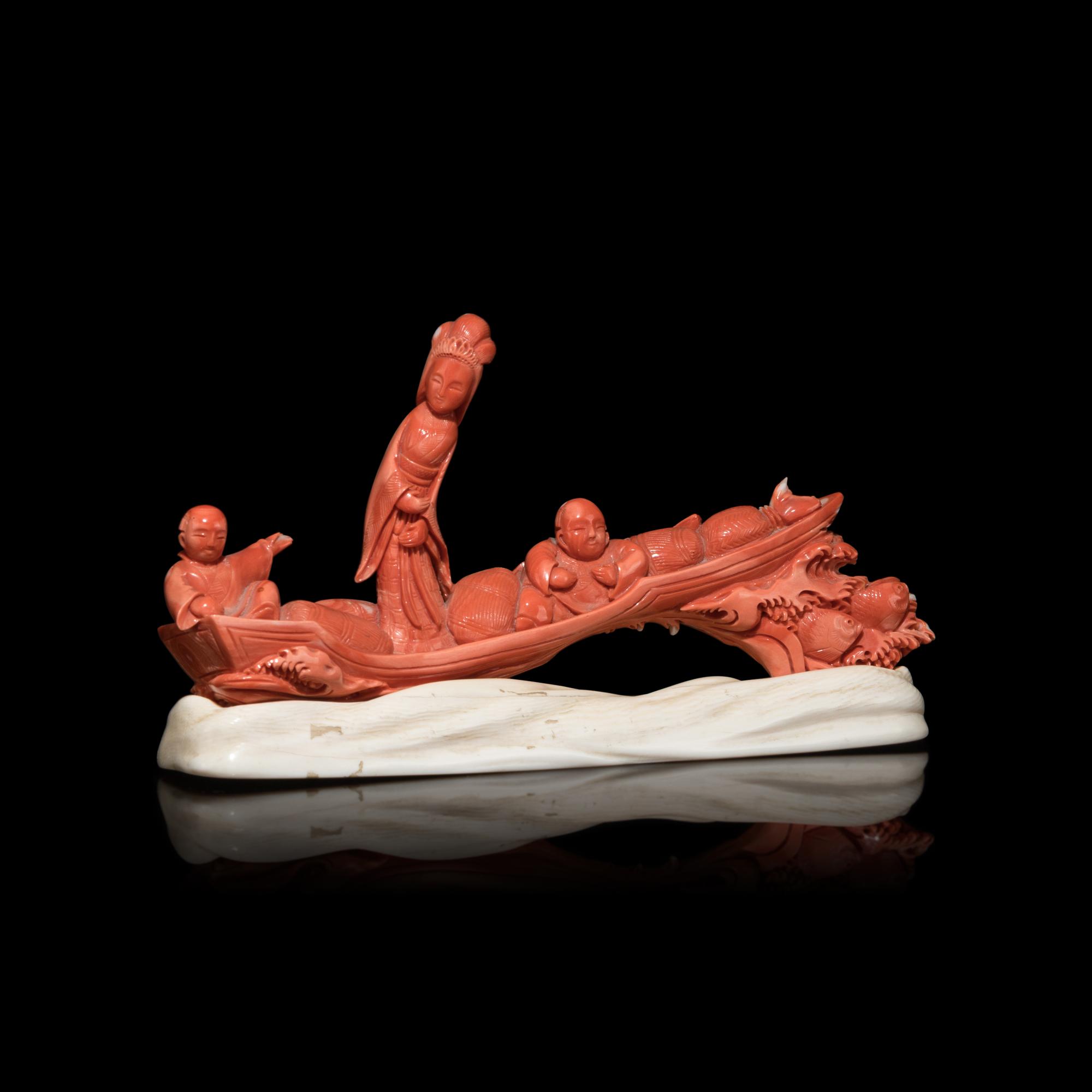 A Chinese Red Coral Carving of a Lady and Two Boys, 19th Century 清晚期 珊瑚雕仙女童子汎舟擺件