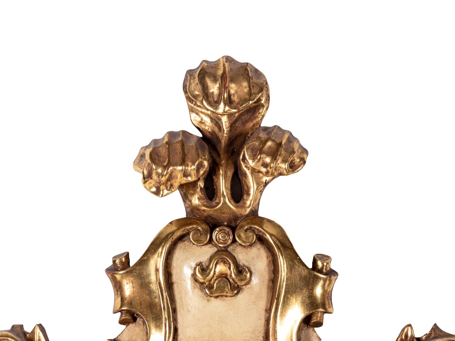 A Painted and Parcel Giltwood Mirror
