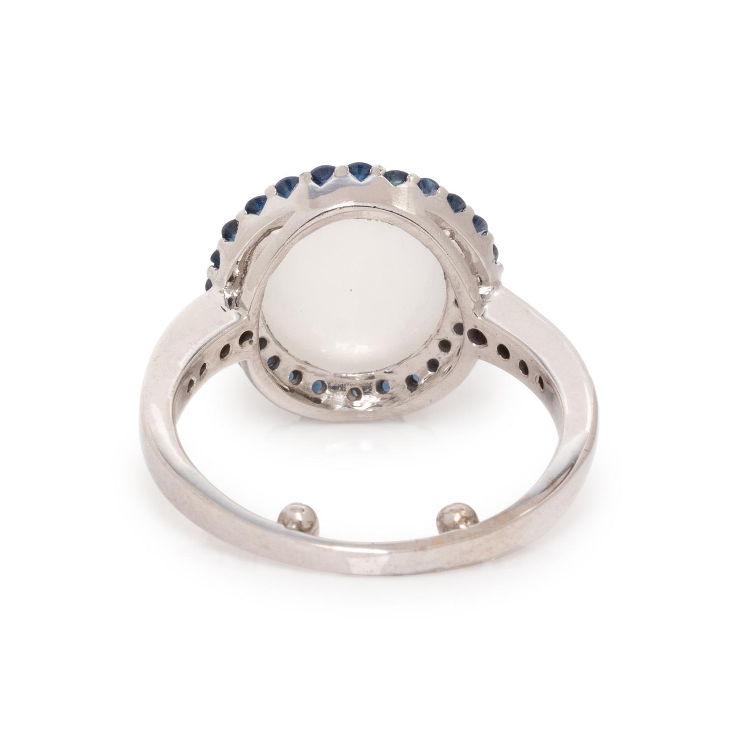 WHITE GOLD, CAT'S EYE MOONSTONE AND SAPPHIRE RING