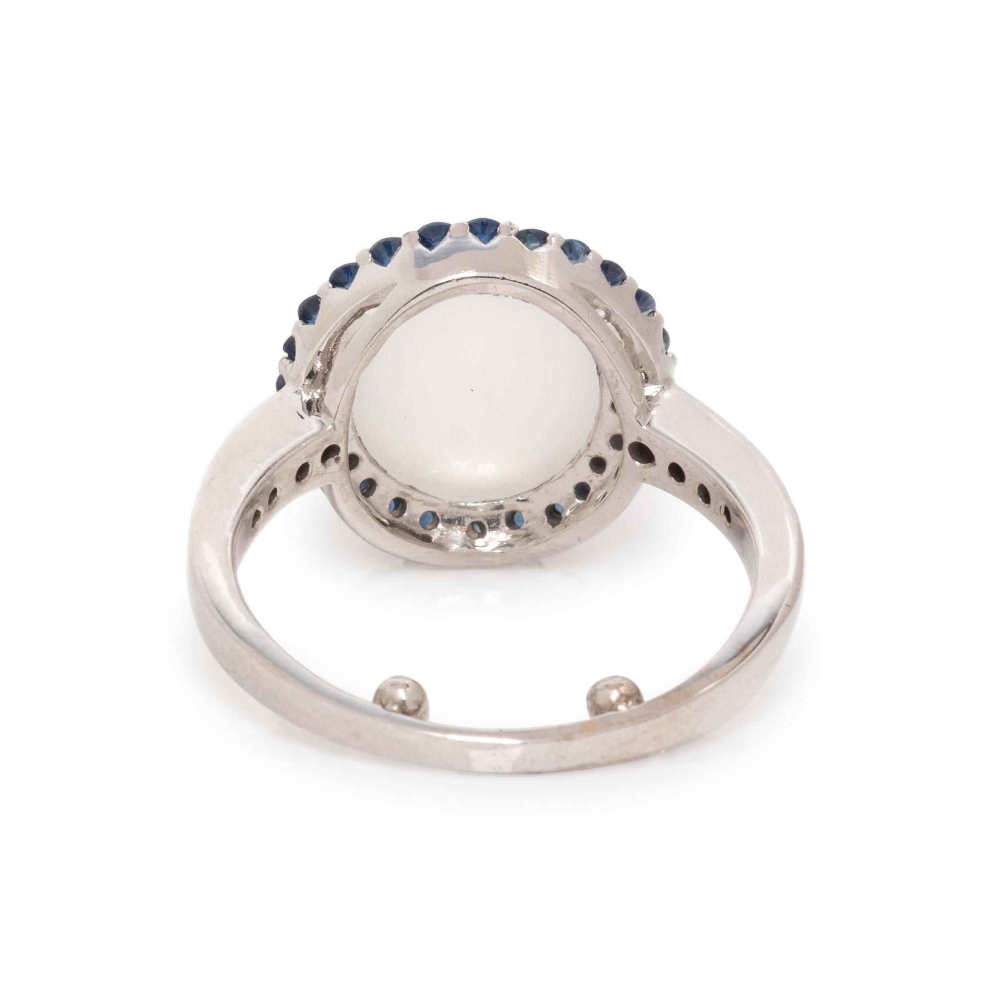 WHITE GOLD, CAT'S EYE MOONSTONE AND SAPPHIRE RING