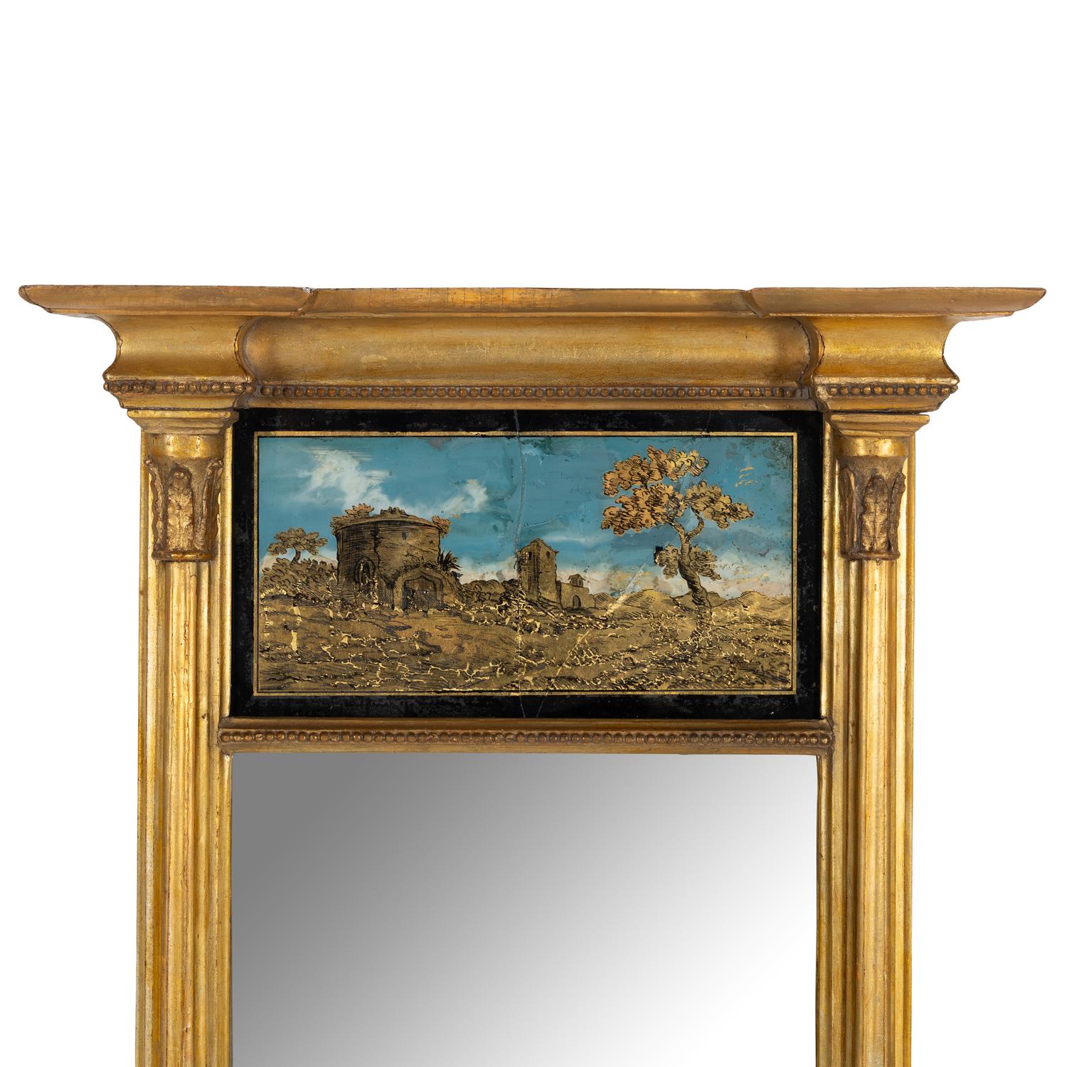 A Classical Giltwood and Eglomisé Mirror