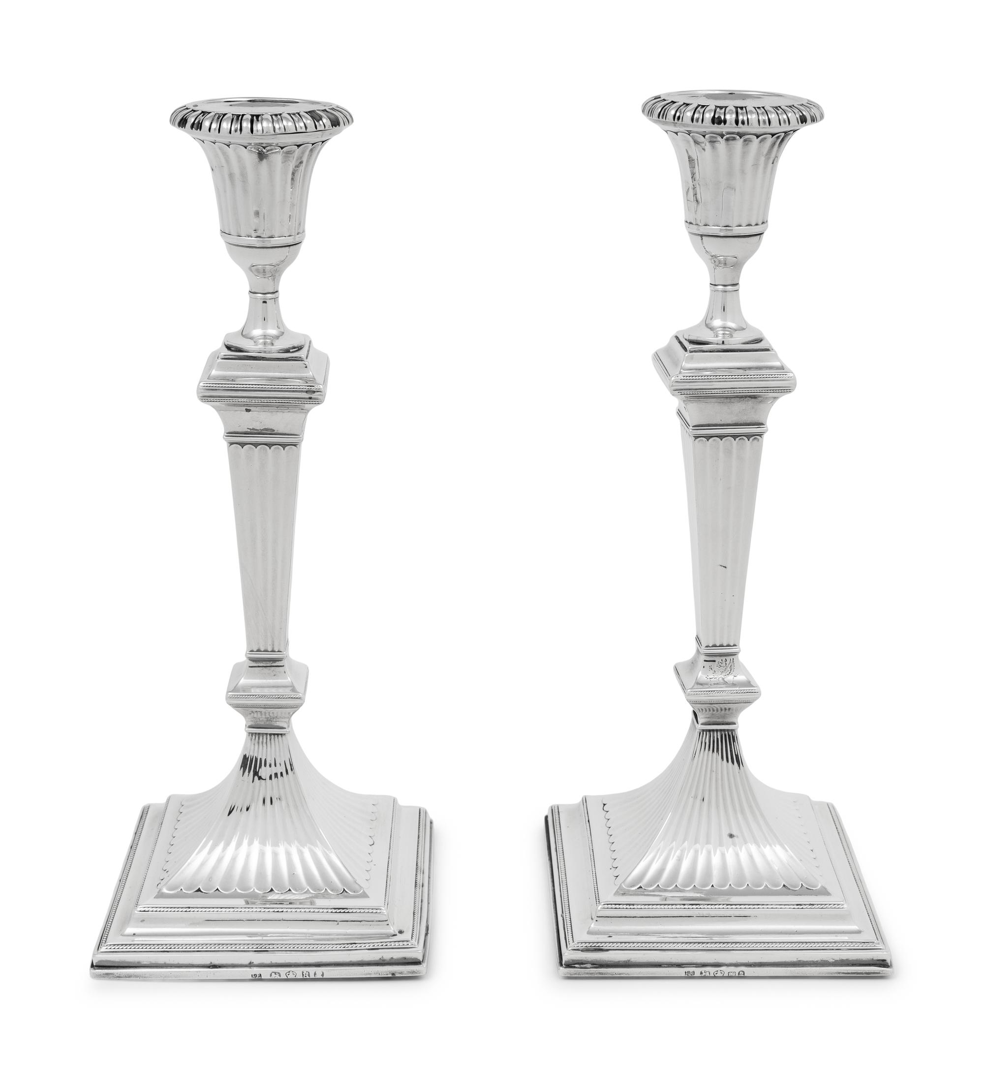 A Pair of English Silver Candlesticks