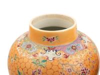 A Pair of Chinese Ochre Ground Famille Rose Porcelain Covered Jars