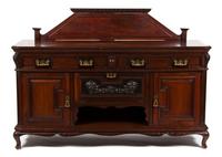 An English Carved Mahogany Sideboard Height 50 3/4 x width 71 1/2 x depth 25 3/4 inches. — LATE 19TH CENTURY
