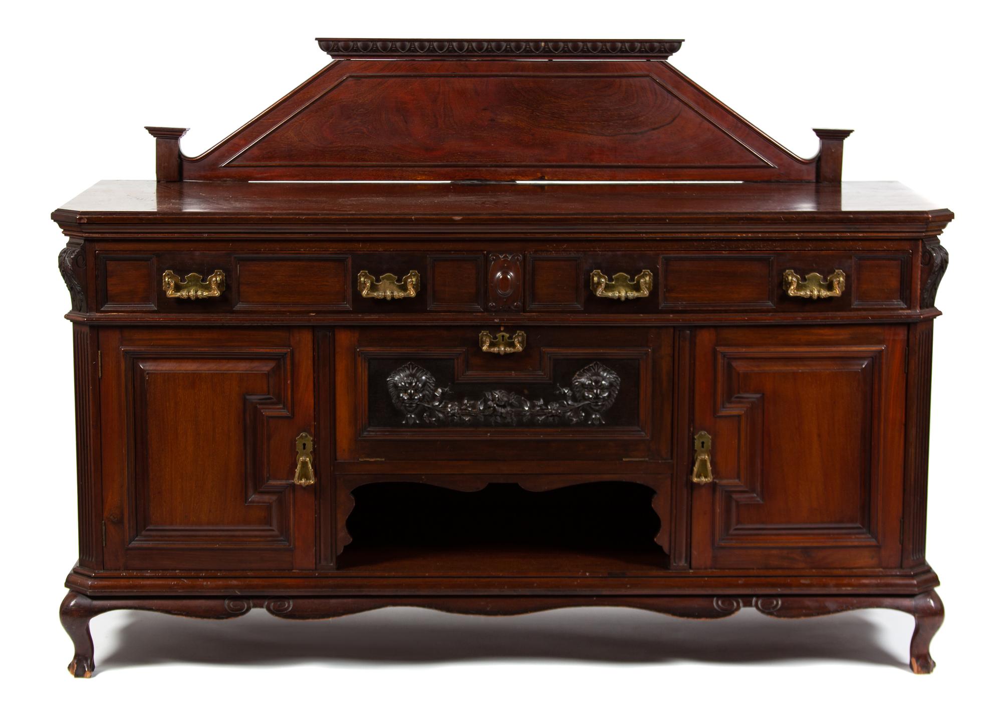 An English Carved Mahogany Sideboard Height 50 3/4 x width 71 1/2 x depth 25 3/4 inches. — LATE 19TH CENTURY