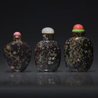 Three Chinese Amygdaloidal Basalt Snuff Bottles, Qing Dynasty, Late 18th to 19th Century — 清中期 玄武岩素面鼻煙壺三支