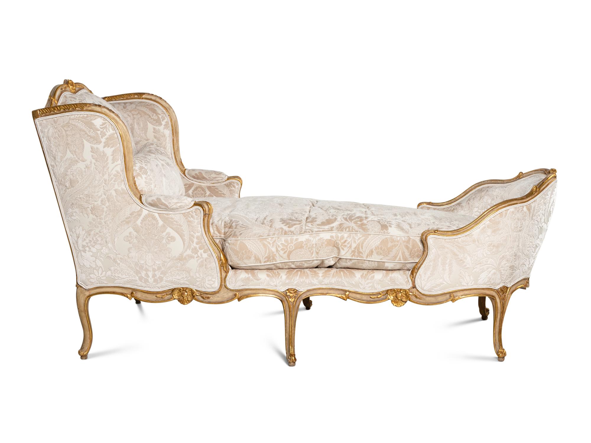 A Louis XV Painted and Parcel Gilt Duchesse en Bateau